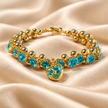 Load image into Gallery viewer, Blue crystal heart charm beaded bracelet