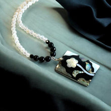 Load image into Gallery viewer, Black and white gemstone necklace with flower pendent