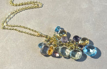 Load image into Gallery viewer, Necklace with multicolored gemstones on a light background
