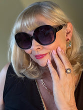 Load image into Gallery viewer, Oval black sunglasses with god details