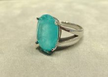 Load image into Gallery viewer, side view of oval paraiba tourmaline ring

