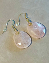 Load image into Gallery viewer, Rose quartz earrings with gold accents on a light background