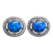 Load image into Gallery viewer, Pair of earrings with blue gemstones and silver circular designs on a white background
