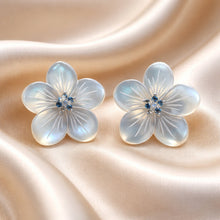 Load image into Gallery viewer, Flower-shaped earrings with gemstones on a satin background