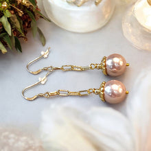 Load image into Gallery viewer, Long pink  pearl earrings in gold