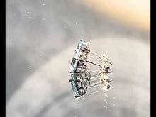 Load and play video in Gallery viewer, Video of blue topaz stud earrings