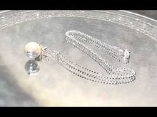 Load and play video in Gallery viewer, Video of white mother of pearl necklace
