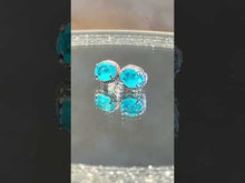 Load and play video in Gallery viewer, Video of Neon blue Paraiba Tourmaline stud earrings