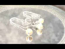 Load and play video in Gallery viewer, Video of white pearl earrings and necklace set