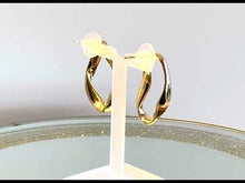 Load and play video in Gallery viewer, Video of gold stud earrings