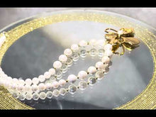 Load and play video in Gallery viewer, gold flower pearl pendant necklace