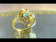 Load and play video in Gallery viewer, Two tone gold and silver blue topaz gemstone ring