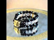 Load and play video in Gallery viewer, Video of beaded woven black and white gemstone bracelet