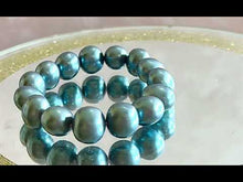 Load and play video in Gallery viewer, Stretch beaded blue freshwater pearl bracelet