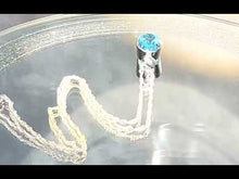 Load and play video in Gallery viewer, Video of blue topaz necklace