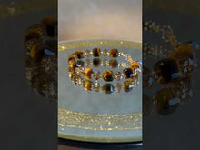 Load and play video in Gallery viewer, Tiger eye gemstone bracelet in gold filled