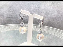 Load and play video in Gallery viewer, Video of mother of pearl earrings