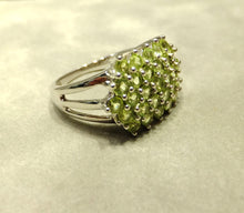 Load image into Gallery viewer, Side view of Peridot cluster ring
