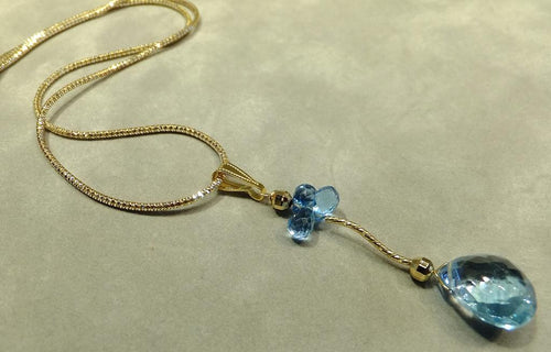 Golden blue topaz drop necklace