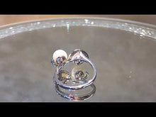 Load and play video in Gallery viewer, Video of natural white pearl and white topaz gemstone ring
