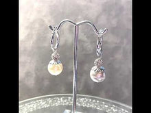 Load and play video in Gallery viewer, Video of white pearl drop bridal earrings
