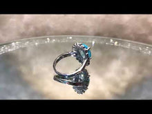 Load and play video in Gallery viewer, Blue Topaz Flower Ring
