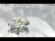 Load and play video in Gallery viewer, Video of peridot gemstone stud earrings
