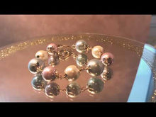 Load and play video in Gallery viewer, Mother of pearl bracelet in Multi colors