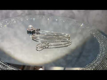 Load and play video in Gallery viewer, video of white pearl and white topaz flower necklace
