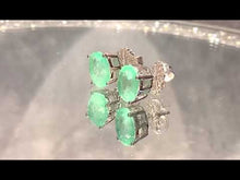 Load and play video in Gallery viewer, Video of Mint green Paraiba Tourmaline earrings