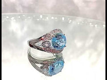 Load and play video in Gallery viewer, Video of blue topaz gemstone ring
