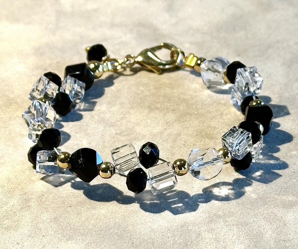 Black and white gemstone woven bracelet