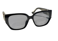 Load image into Gallery viewer, Women&#39;s black sun glasses with silver and red details
