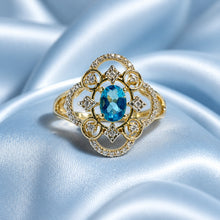Load image into Gallery viewer, Blue topaz two tone silver and gold filigree ring
