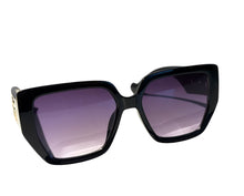 Load image into Gallery viewer, Women;s sun glasses in black with square gold details
