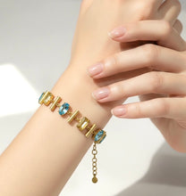 Load image into Gallery viewer, Gold blue topaz and citrine bracelet
