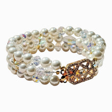 Load image into Gallery viewer, Pearl bracelet with crystal accents on a white background
