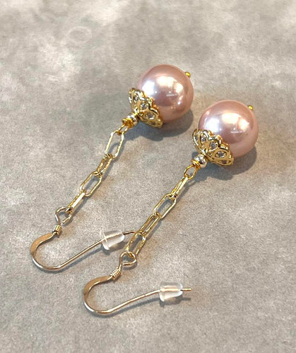 Long Pink pearl earrings in gold