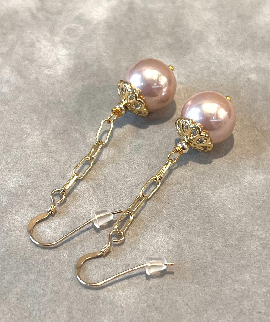 Long Pink pearl earrings in gold