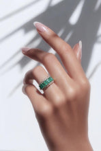 Load image into Gallery viewer, Close up look at emerald gemstone ring on a hand
