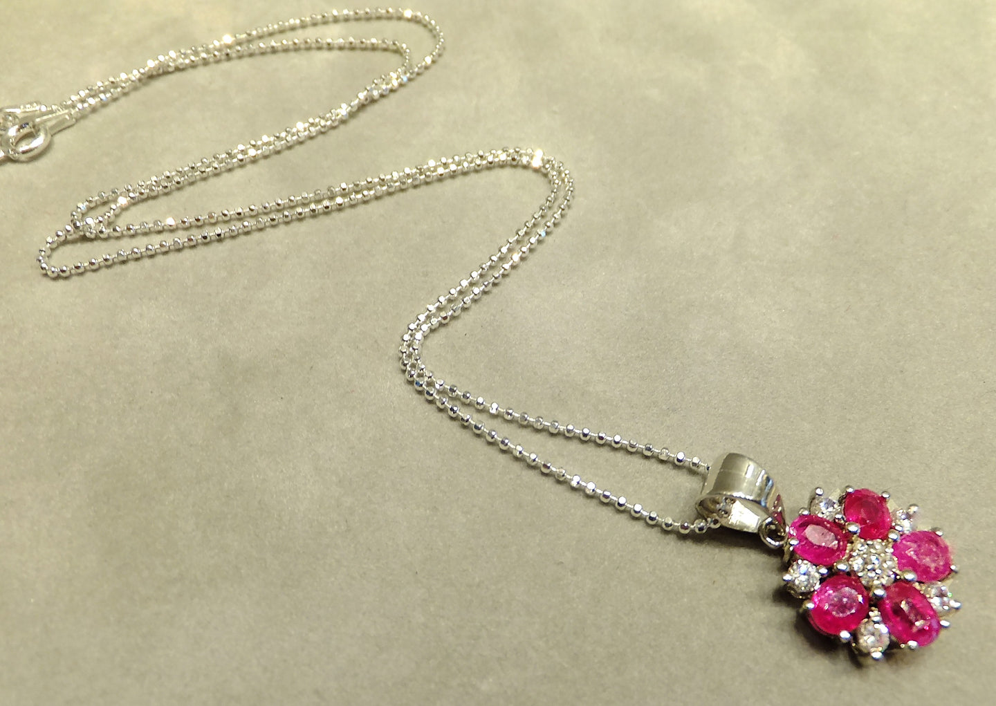 Ruby flower necklace in sterling silver