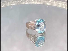 Load and play video in Gallery viewer, Video of blue topaz gemstone ring
