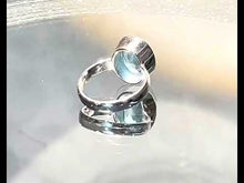 Load and play video in Gallery viewer, Video of blue topaz gemstone ring
