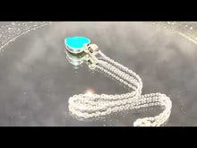 Load and play video in Gallery viewer, Video of heart opal pendant necklace
