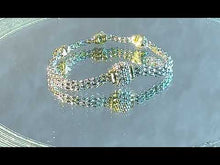 Load and play video in Gallery viewer, Two tone silver and gold bracelet
