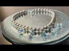 Load and play video in Gallery viewer, Taupe mother of pearl and crystal teardrop necklace
