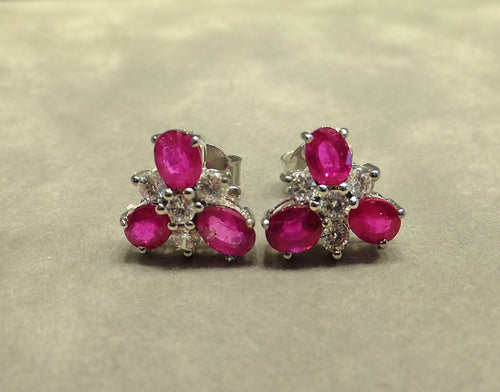 Three gemstone ruby stud earrings