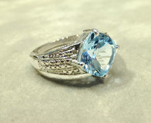 Load image into Gallery viewer, Blue topaz gemstone in sterling silver
