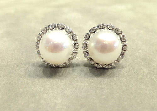 white pearl stud earrings in sterling silver