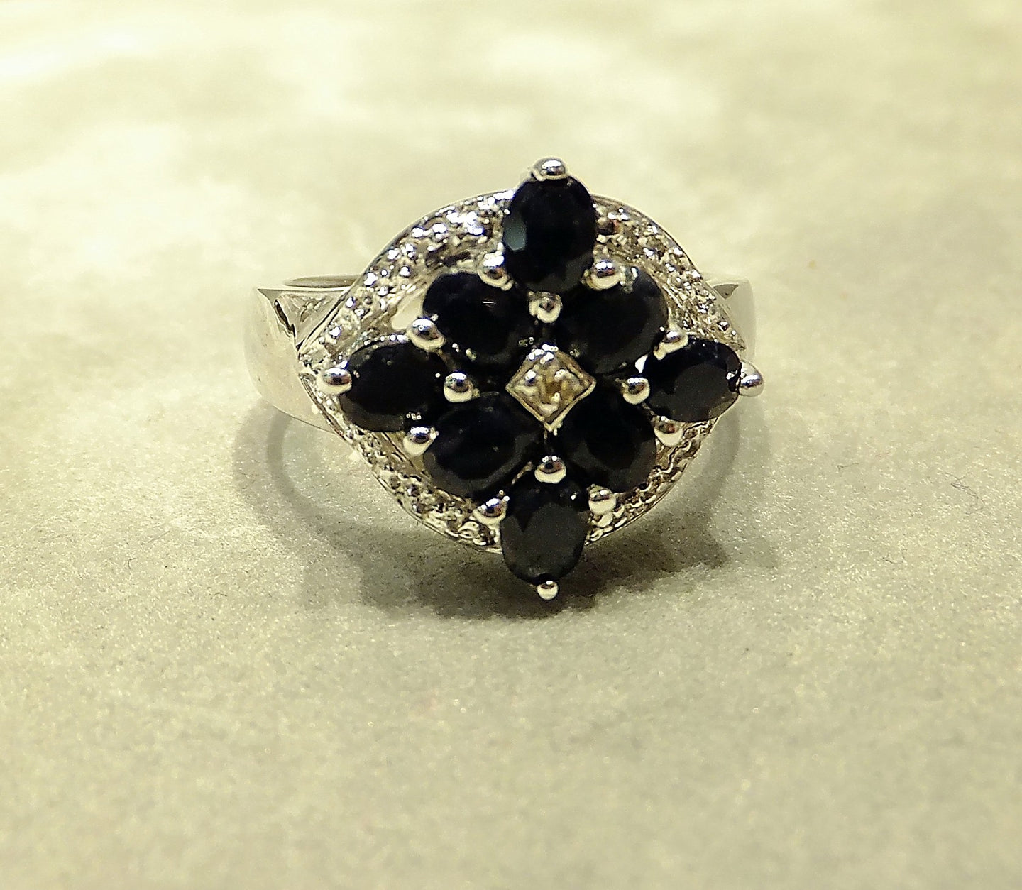 Black sapphire and white topaz gemstone ring